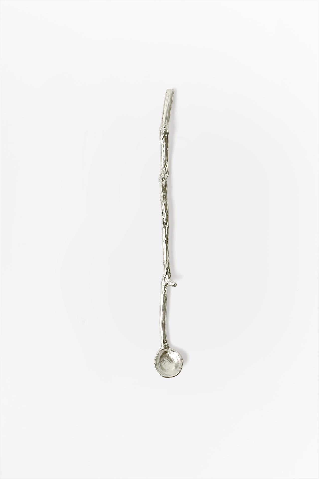 Silver spoon on a white background