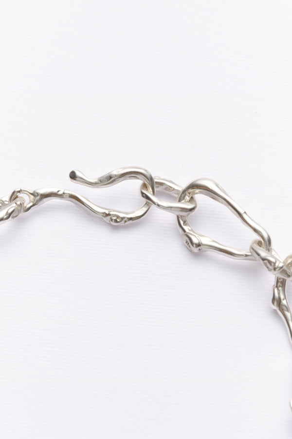 Silver sculptural chain bracelet link detail