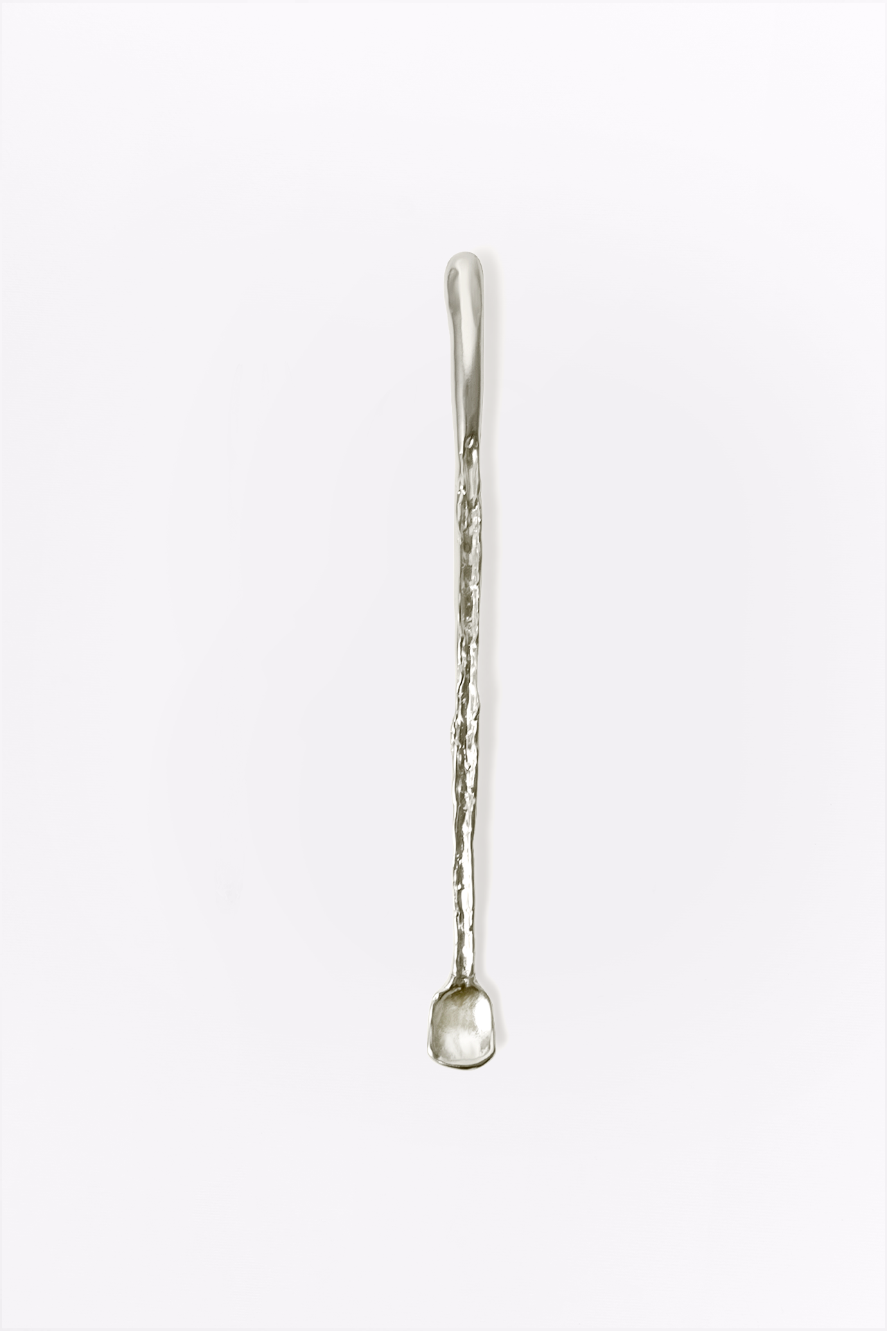 Silver spoon on a white background