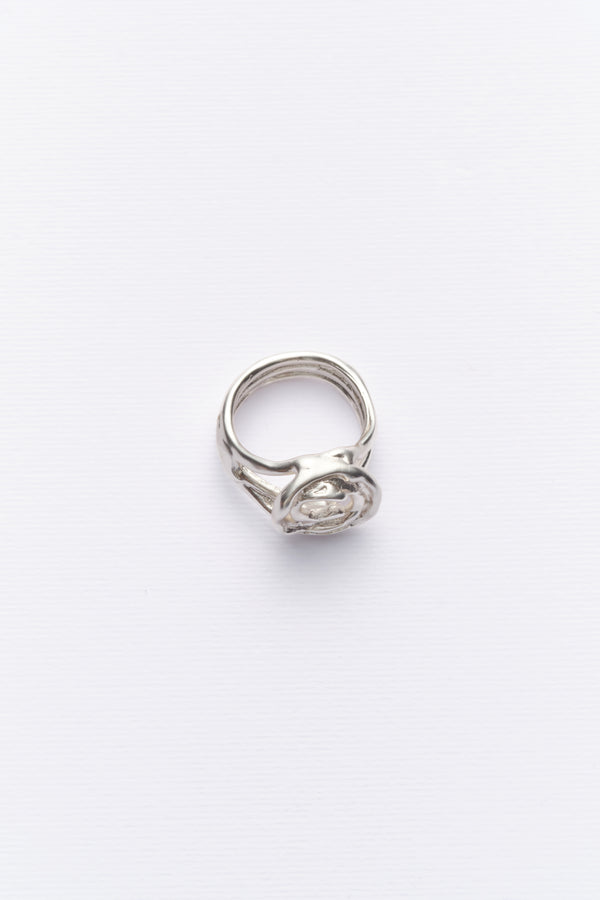 Silver sculptural spiral statement ring angled view