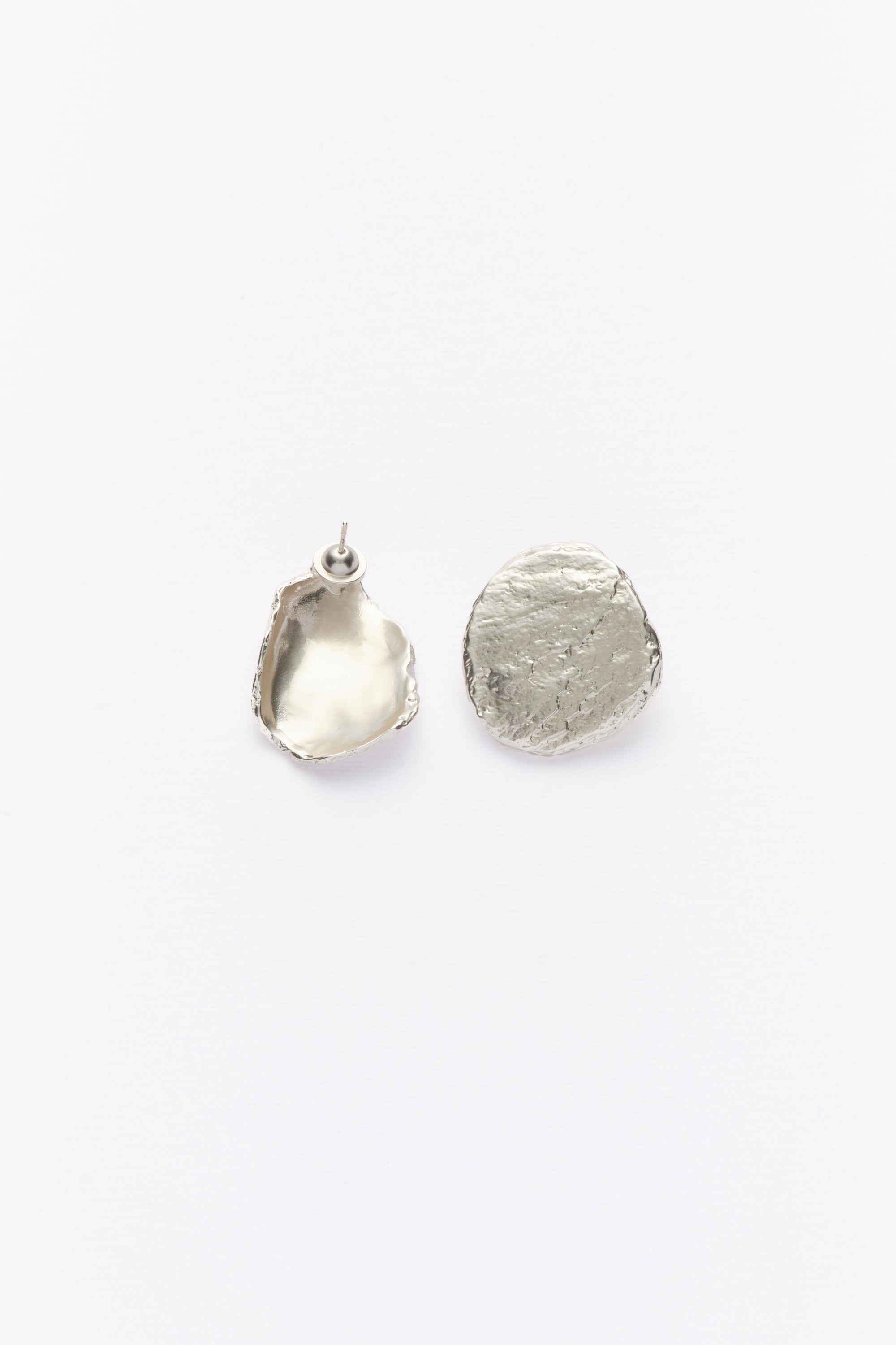 Silver organic textured stud earrings front and back view