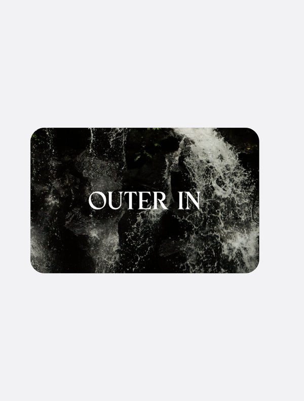 Black and white abstract design with 'OUTER IN' text on a light gray background