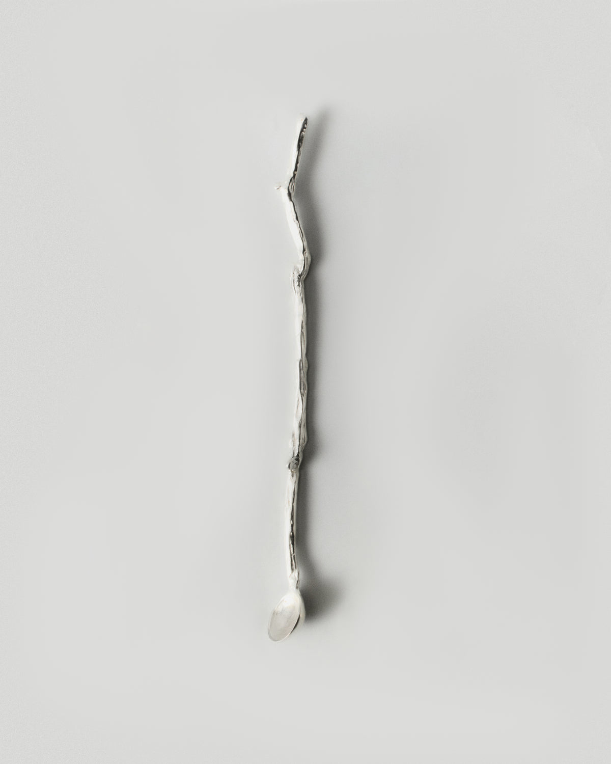 Autumn Stirring Stick Set of 4 in silver: single curved branch-shaped stirring stick.