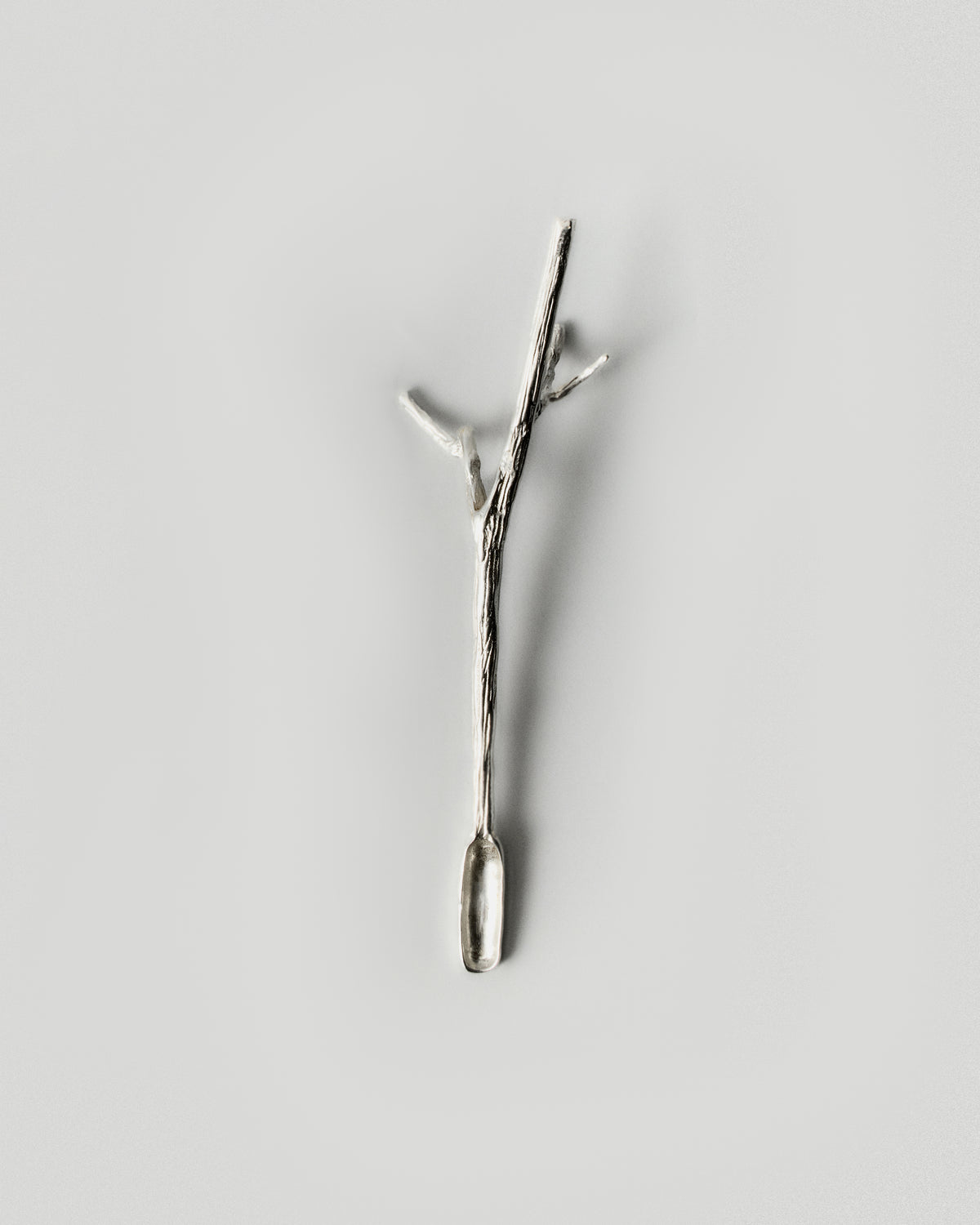 Autumn Stirring Stick Set of 4 in silver: full view of the forked branch-shaped stirring stick.