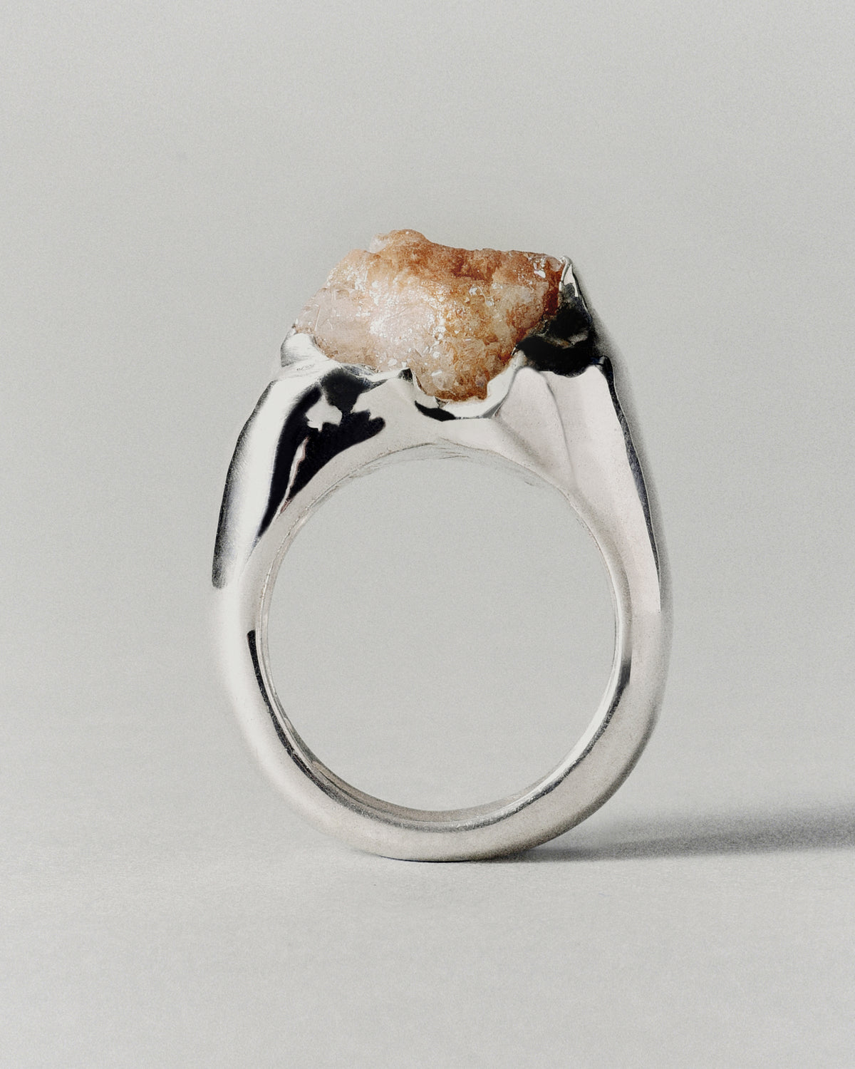 Cosmos Citrino Ring in silver: side profile of the ring's pale honey-colored stone setting.