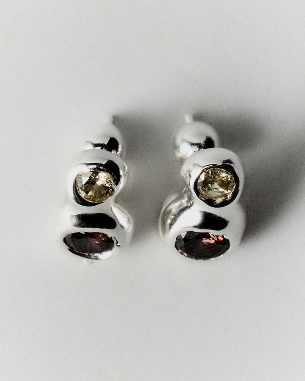 Double Pepita Studs Earrings in silver: reverse view showing the double-stone studs' rounded settings.