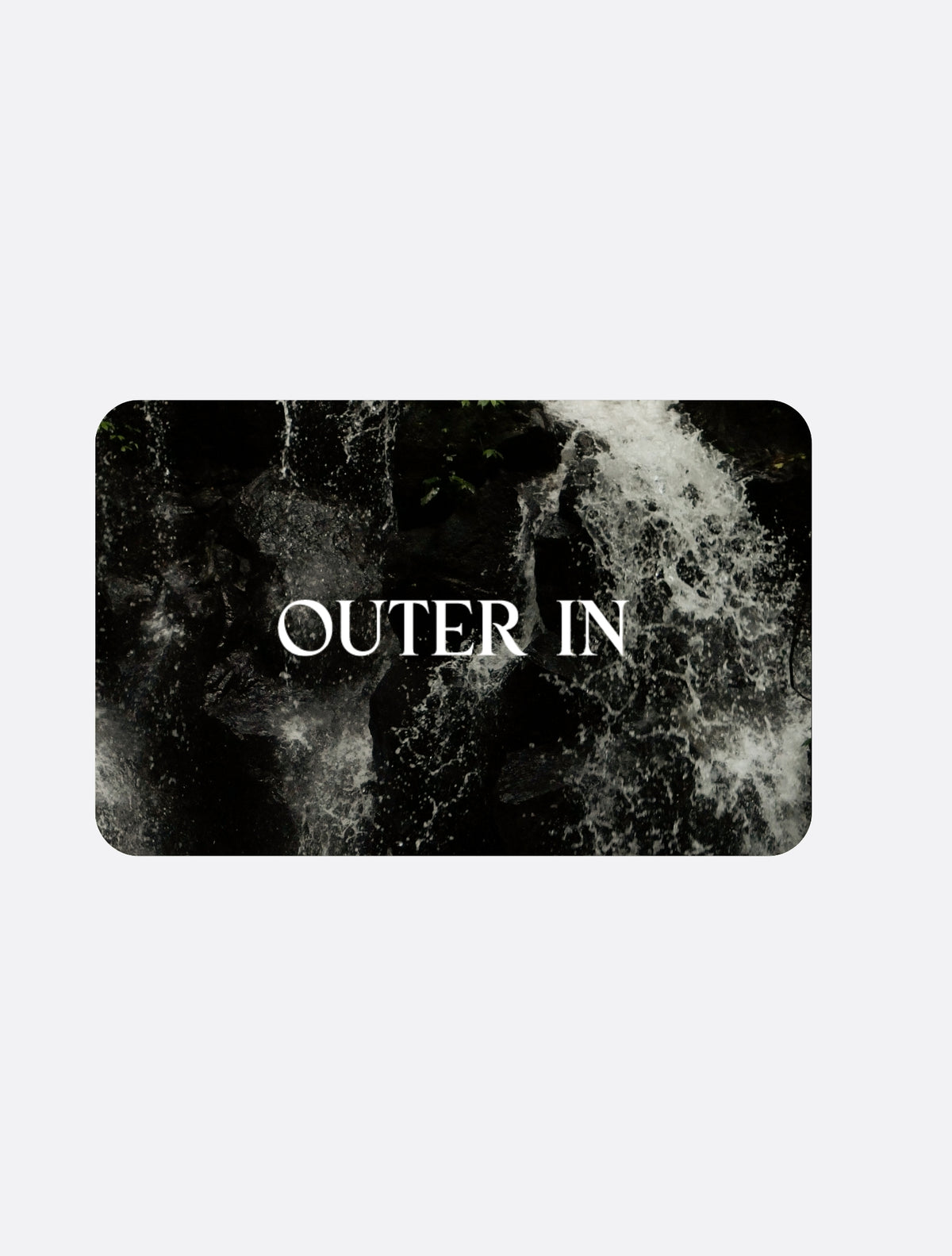 Outer In gift card with a dark monochrome nature texture.