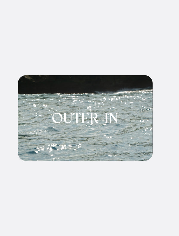 Outer In gift card with a pale blue water texture.