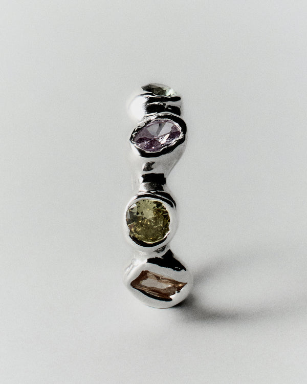 Prado Pepita Ring in silver: ring standing upright with three contrasting stone settings.